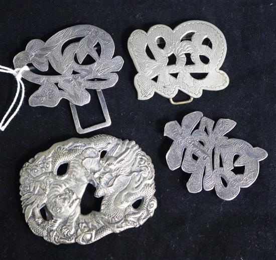 An early 20th century Chinese Export silver buckle by Tuck Chang & Co and two other Chinese buckle sections, one stamped 900.